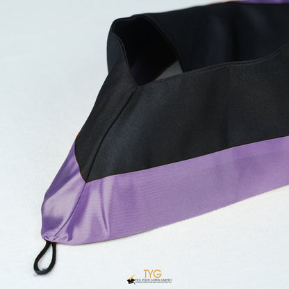 Detailed view of a bachelor’s hood in black with purple satin lining.