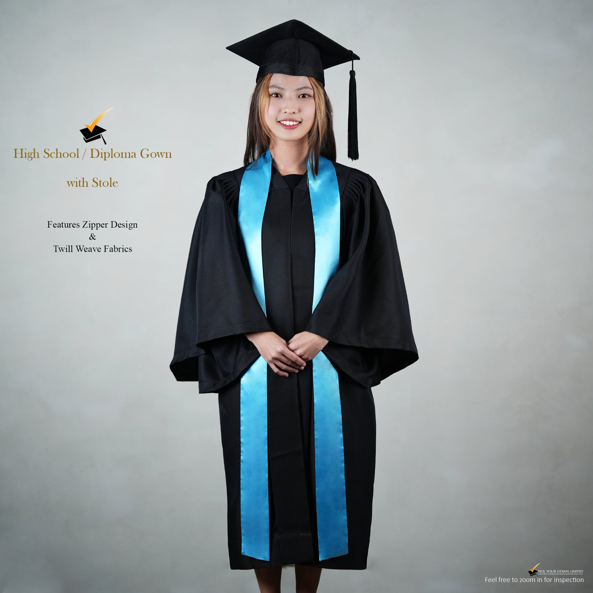 A person wearing a black high school diploma graduation gown with a blue stole, cap, and tassel.