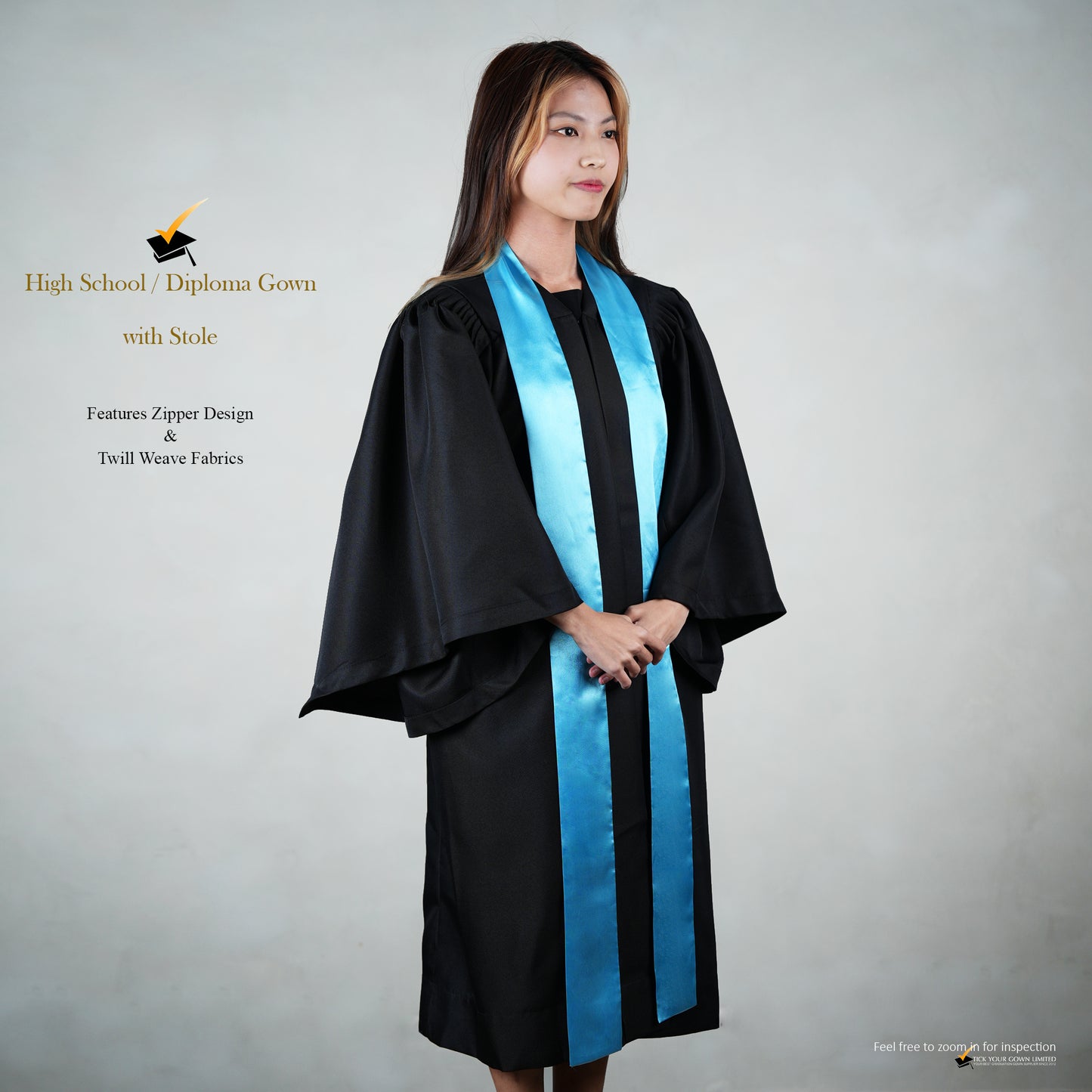 A person wearing a black high school graduation gown with a blue satin stole but no mortaboard, shown in a profile view.