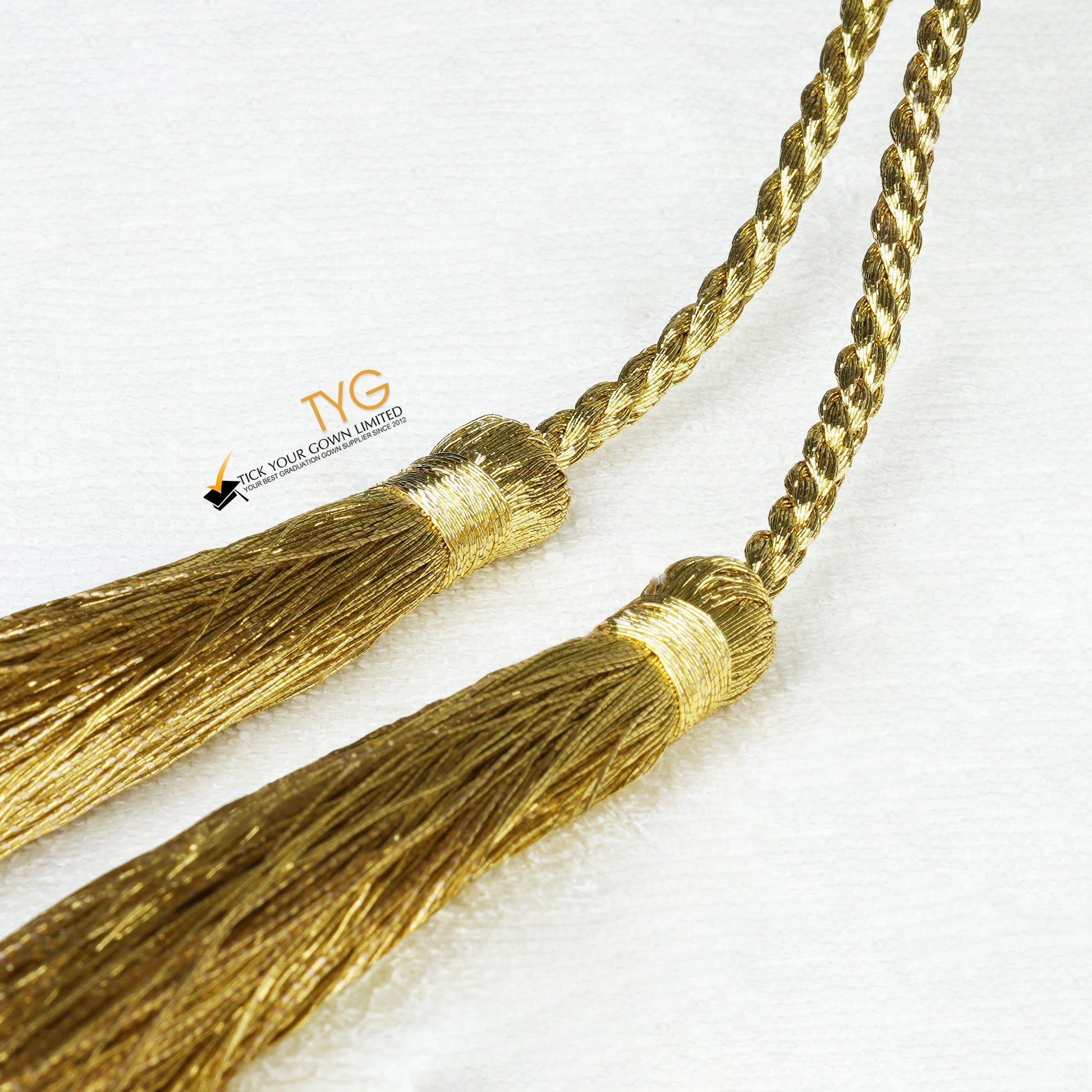 A detailed view of honor cords in gold