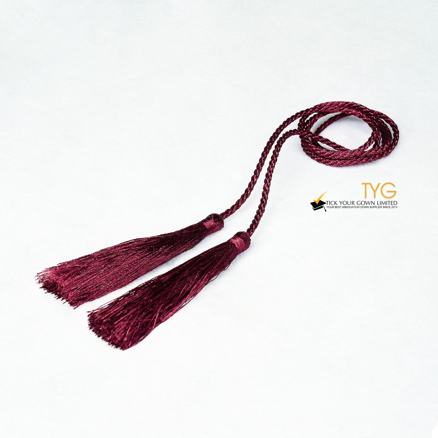 Red tassel on a white background.