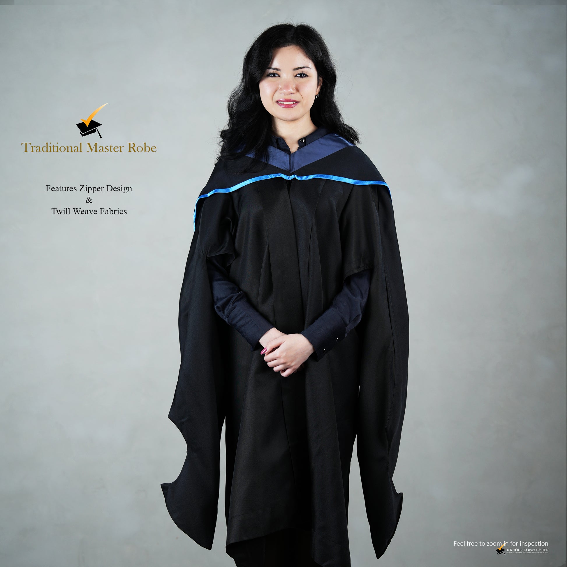 A person wearing a traditional black master's robe with a zipper and a blue hood.