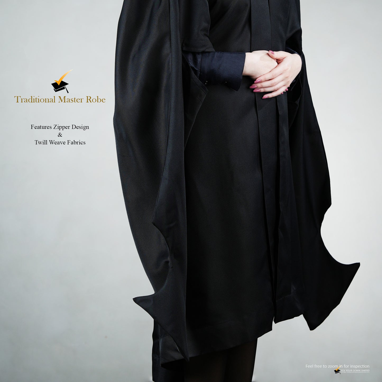 Profile view of a person wearing a traditional black master's robe for the blue hood set