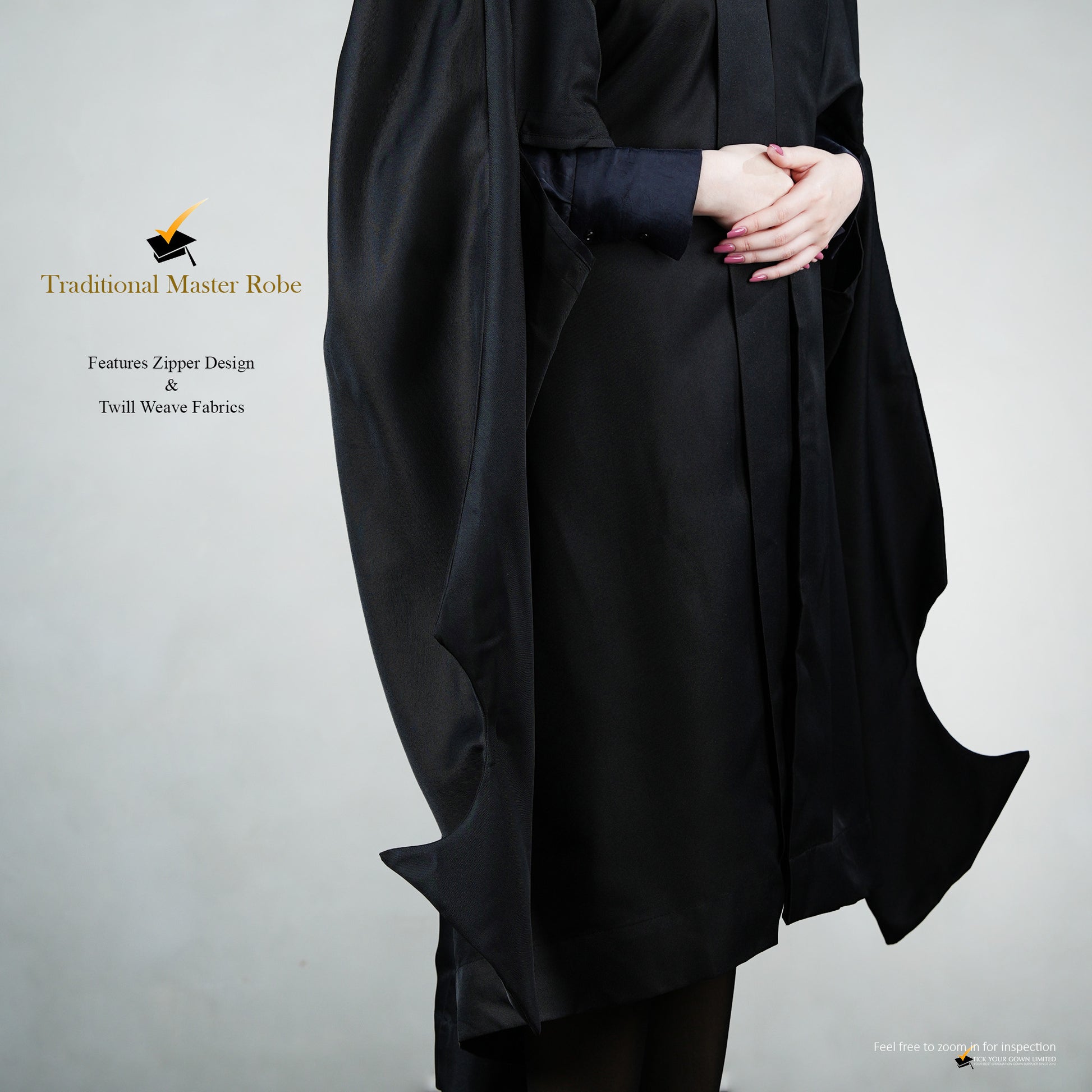 Profile view of a person wearing a traditional black master's robe for the blue hood set