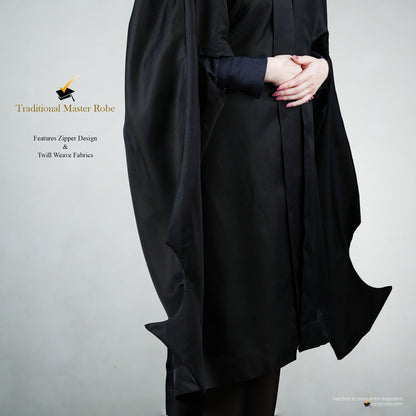 Profile view of a person wearing a traditional black master's robe for the blue hood set