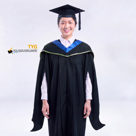 A woman in a black master's graduation gown classic UK with a blue hood with green accent and with a black mortarboard cap with an black tassel against a gray background.