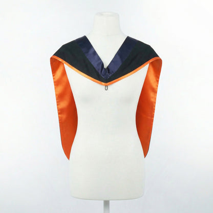 Master's graduation hood displayed on a mannequin showing full shape with black body, dark navy blue hood, and orange satin lining.