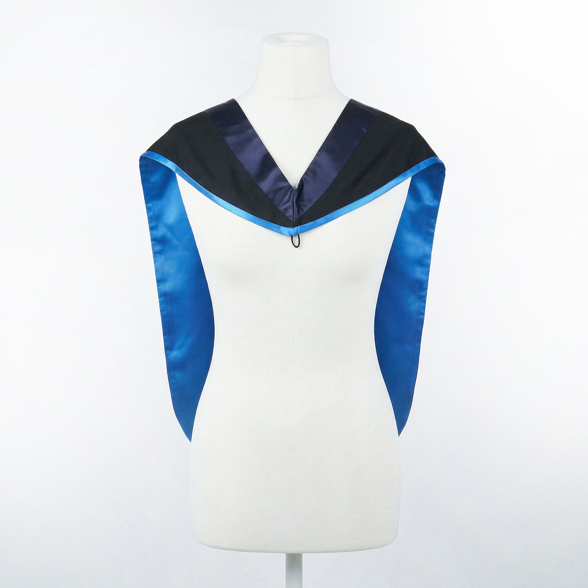 Master's graduation hood displayed on a mannequin showing full shape with black body, dark navy blue hood, and skyblue satin lining.