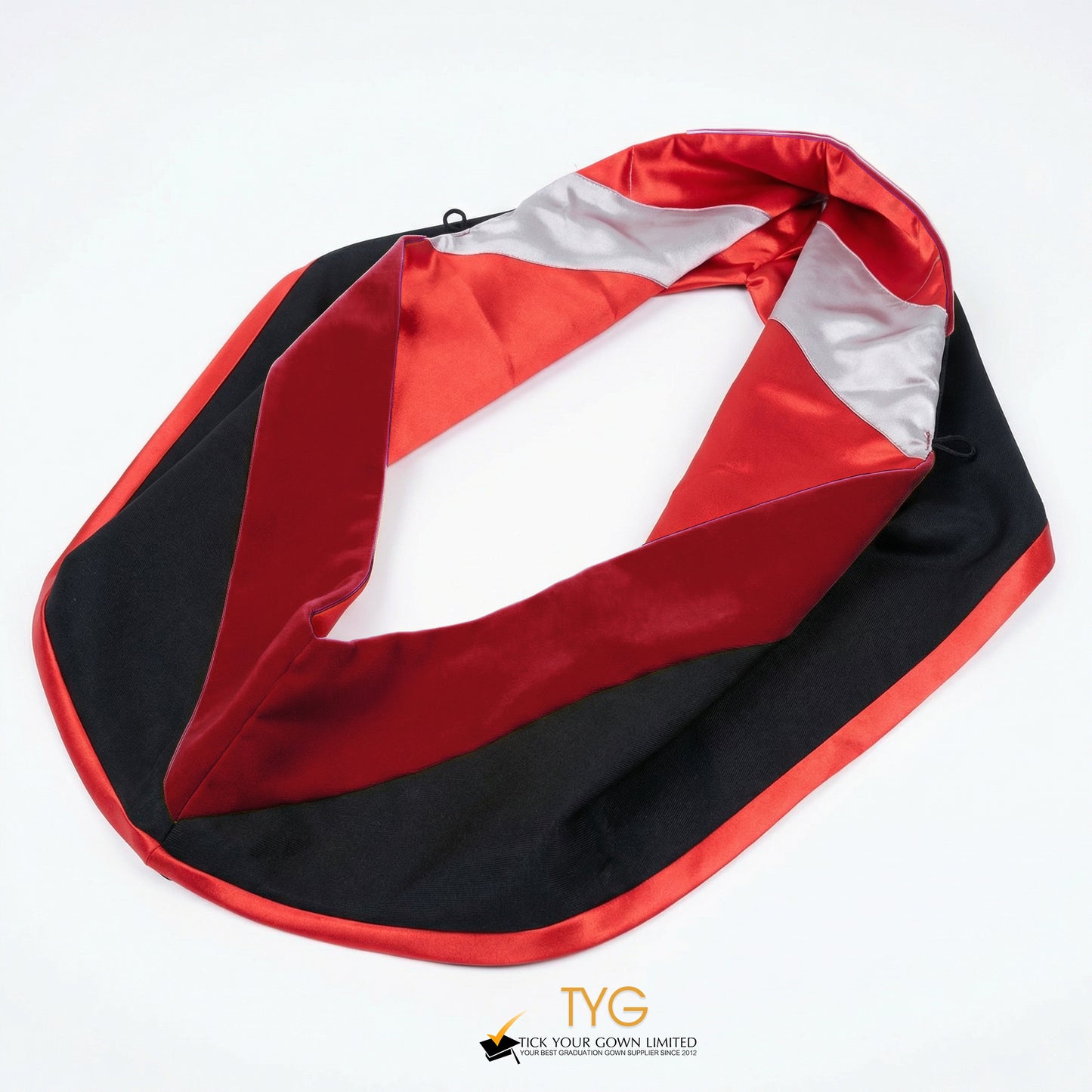 A master's graduation hood featuring black fabric with red velvet hood and red satin lining.