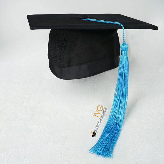 Black graduation cap with blue tassel on a white background
