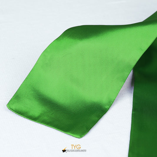 Detailed view of a green stole fabric on a white background.
